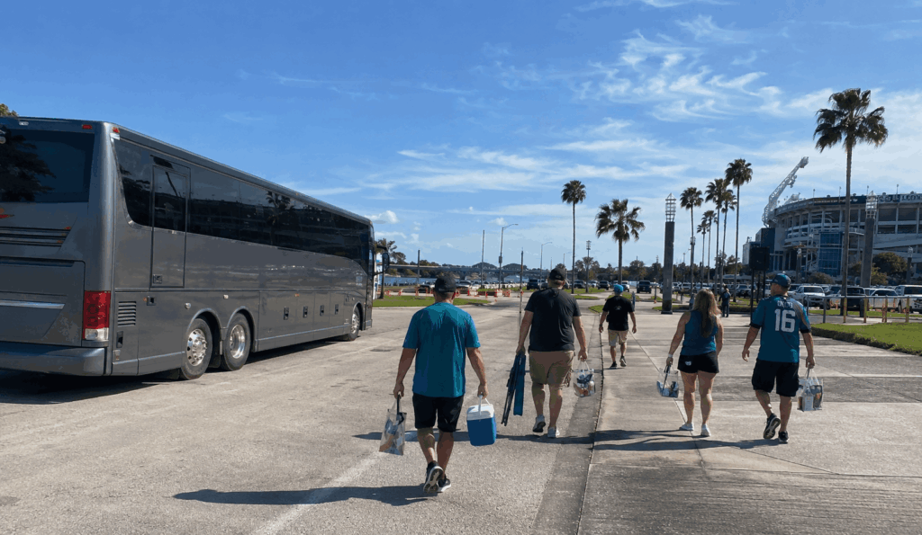 charter bus bringing jaguars fans to everbank stadium for a jacksonville game day shuttle