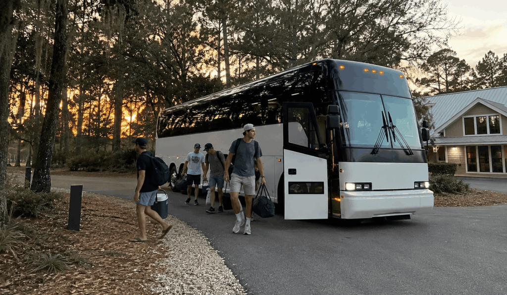 charter bus picking up a church group in a jacksonville church parking lot for a weekend retreat