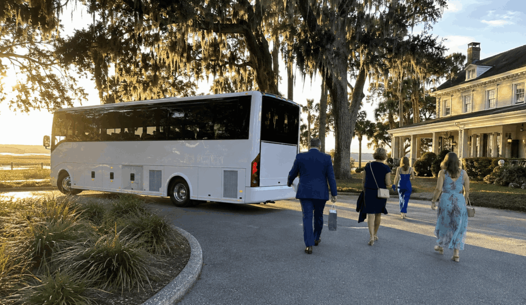 charter bus arriving with wedding guests outside the ribault club on fort george island in jacksonville