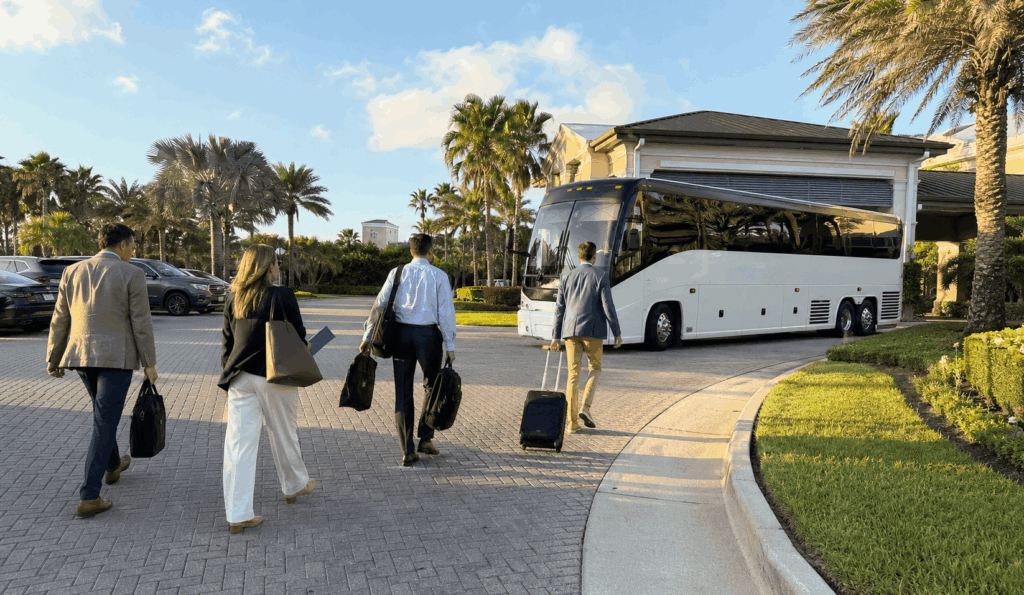 corporate retreat guests boarding a charter bus outside sawgrass marriott in ponte vedra beach