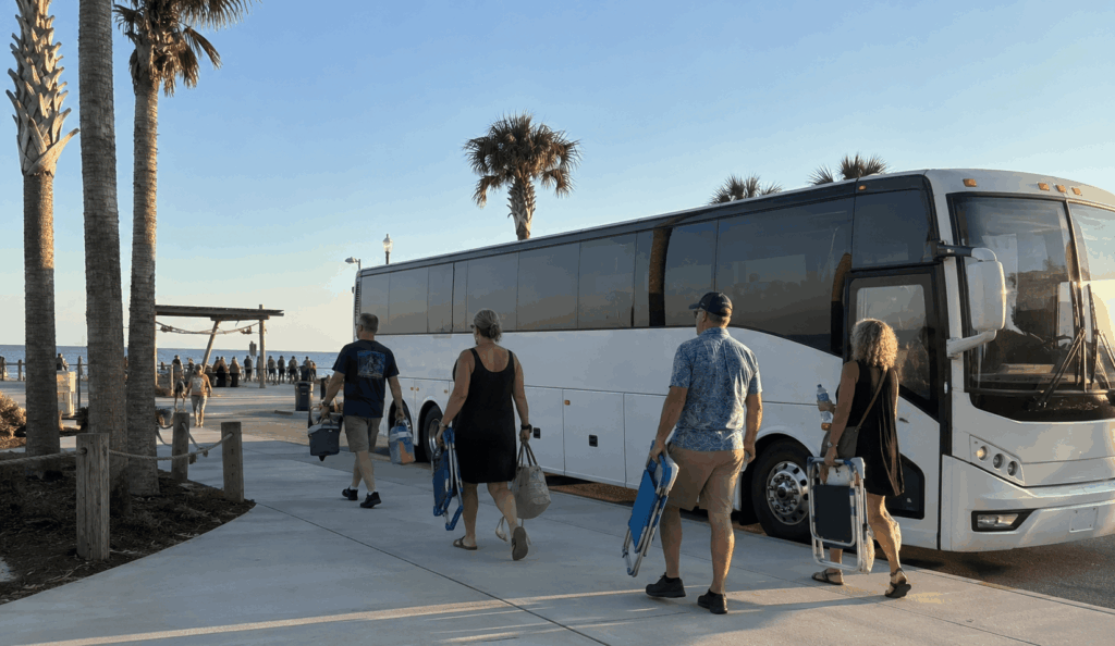 charter bus dropping off festivalgoers near seawalk pavilion for springing the blues in jacksonville beach